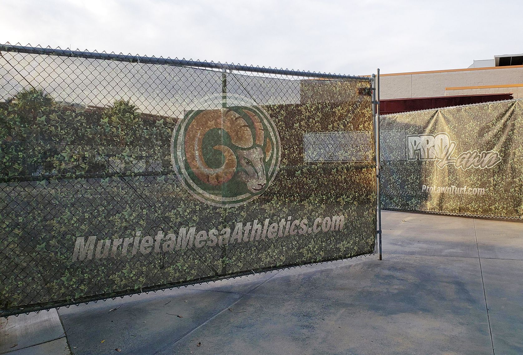Outdoor mesh banner for athletics company